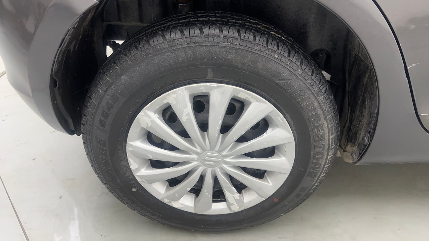 Used 2015 Maruti Suzuki Swift VXi Petrol Manual tyres RIGHT REAR TYRE RIM VIEW