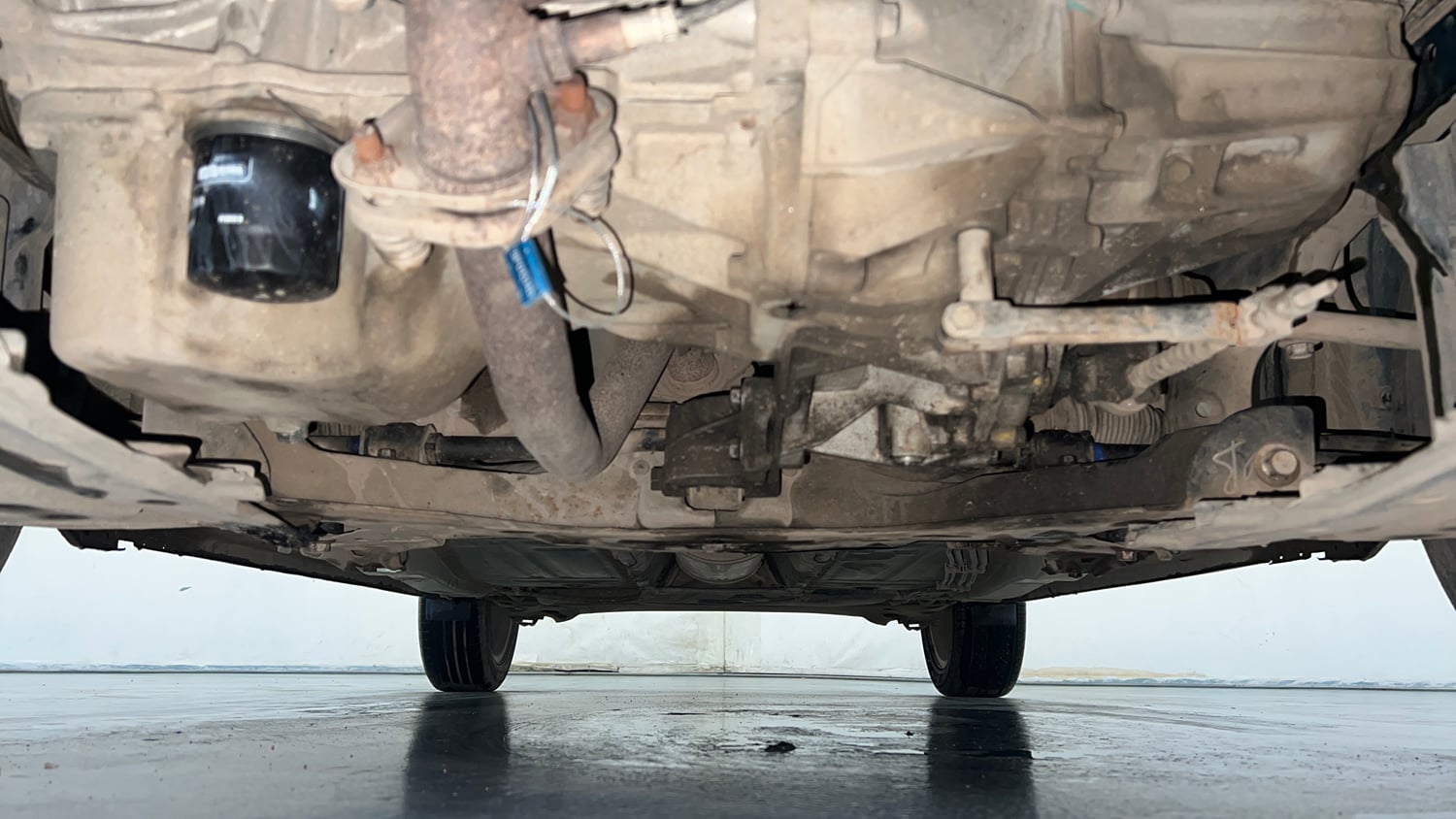 Used 2020 Maruti Suzuki Baleno Zeta Petrol Manual extra FRONT LEFT UNDERBODY VIEW