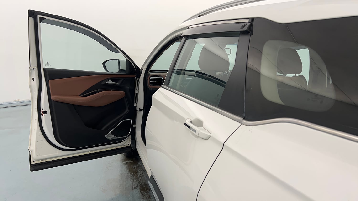 Used 2023 MG Motors Hector Plus Savvy Pro 1.5 Turbo Petrol CVT 7 STR Petrol Automatic interior LEFT FRONT DOOR OPEN VIEW