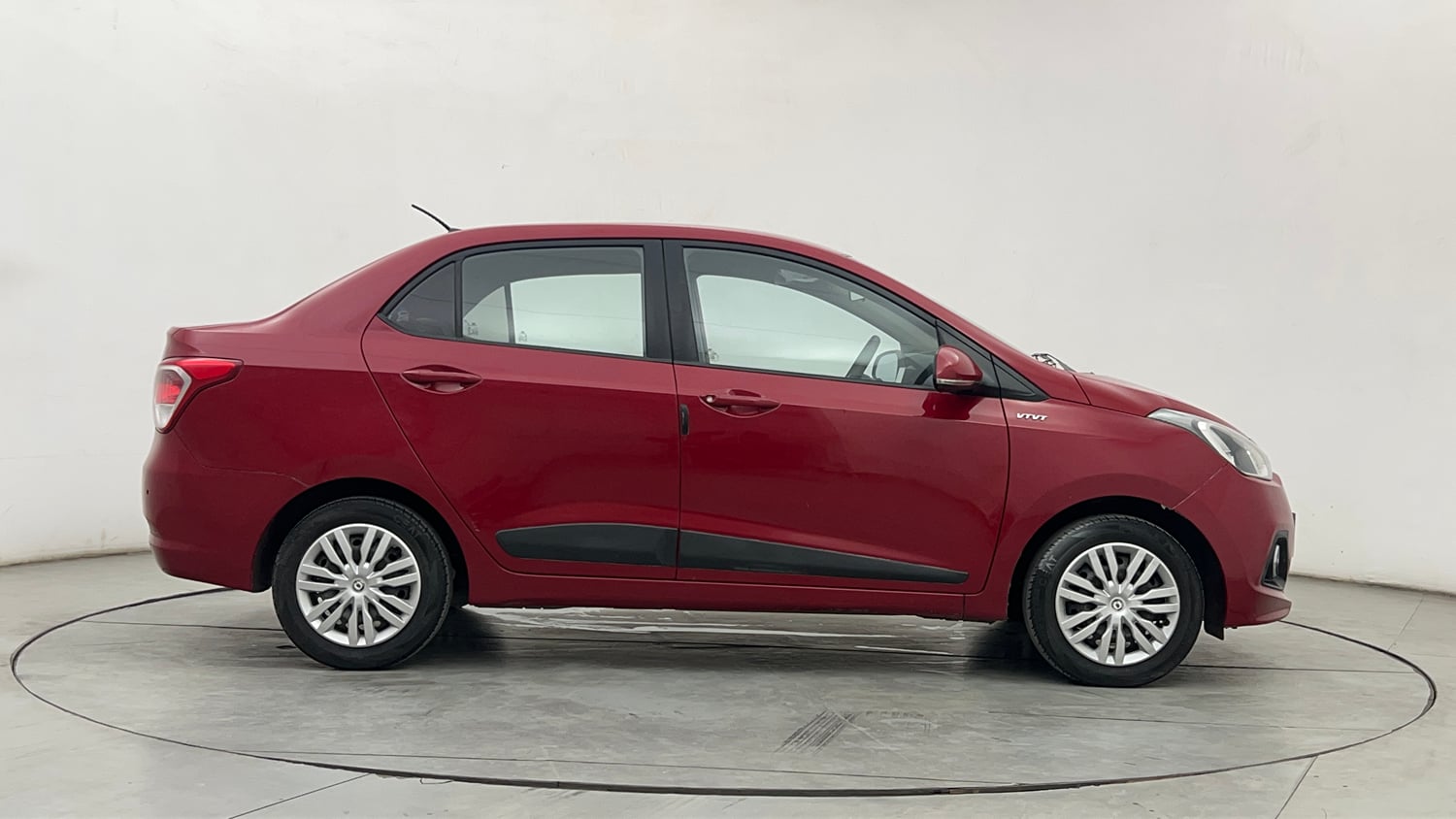 Used 2014 Hyundai Xcent SX 1.2 (O) Petrol Manual exterior RIGHT SIDE VIEW