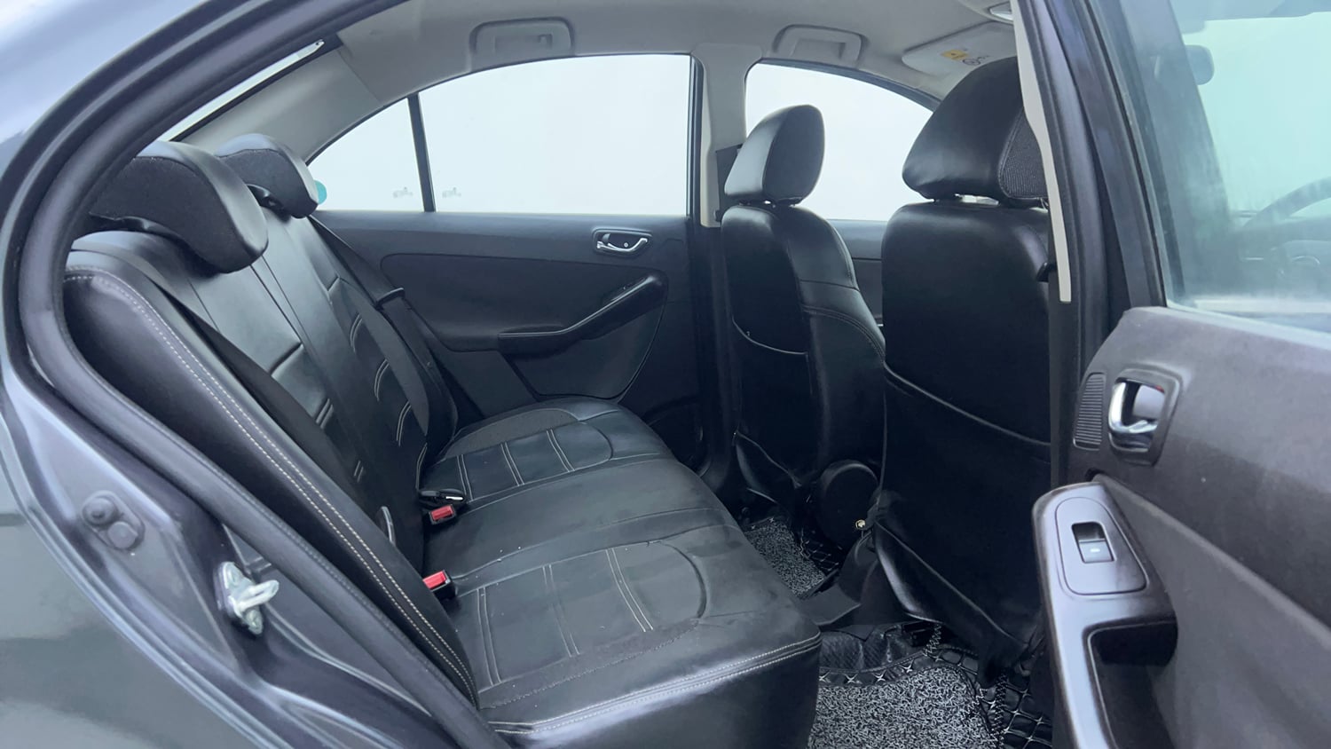 Used 2015 Tata Zest XT Petrol Petrol Manual interior RIGHT SIDE REAR DOOR CABIN VIEW