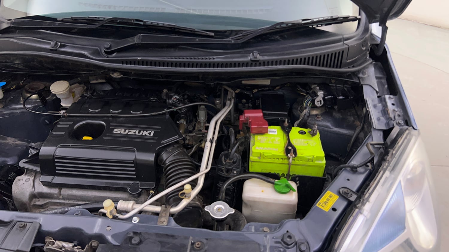 Used 2012 Maruti Suzuki Wagon R LXi Petrol Manual engine ENGINE LEFT SIDE HINGE & APRON VIEW
