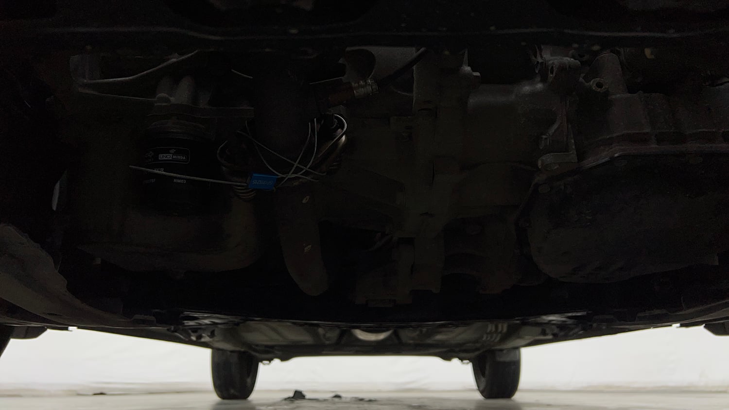 Used 2018 Maruti Suzuki Baleno Delta 1.2 AT Petrol Automatic extra FRONT LEFT UNDERBODY VIEW