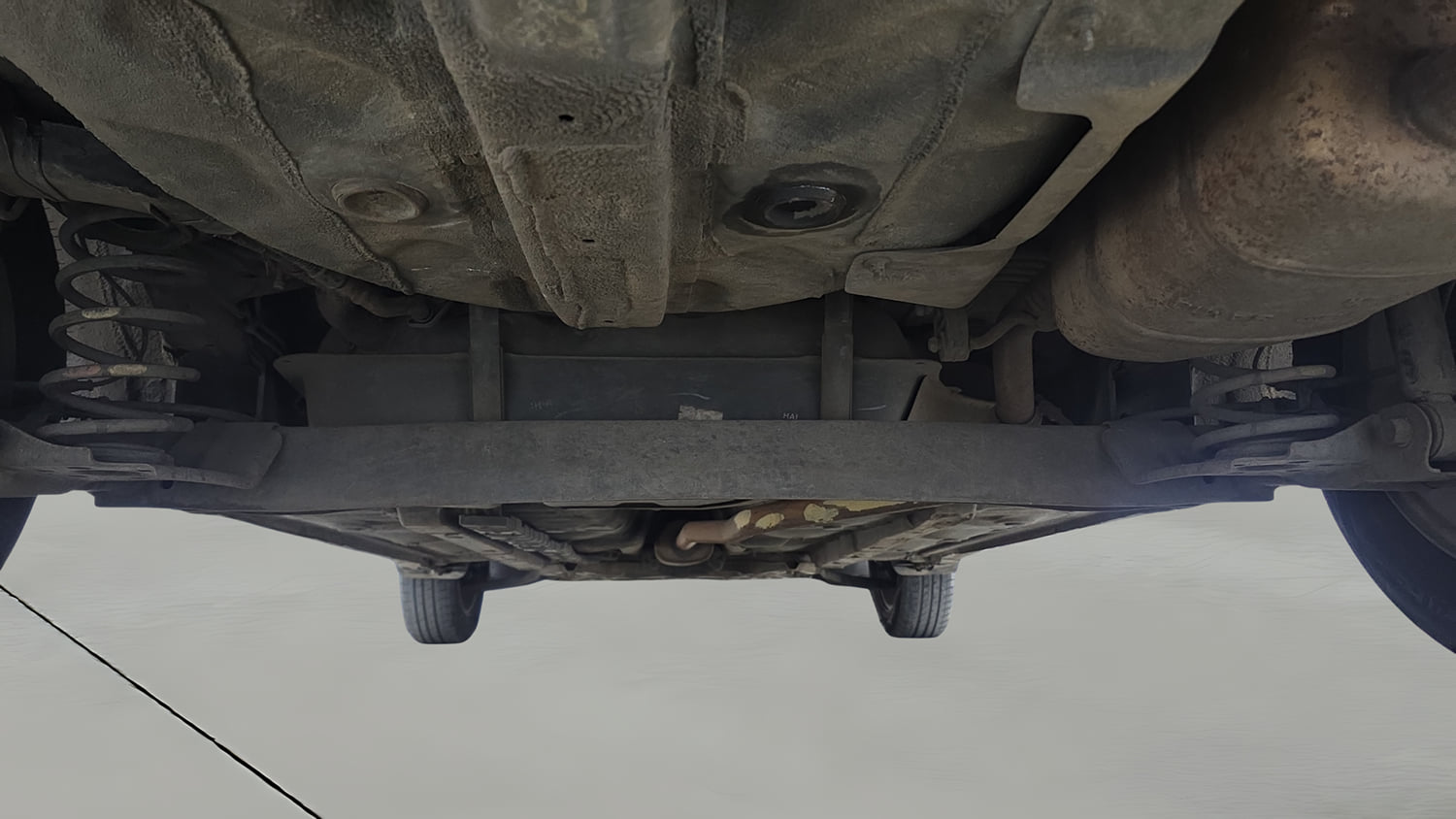 Used 2014 Hyundai Xcent S 1.2 (O) Petrol Manual extra REAR UNDERBODY VIEW (TAKEN FROM REAR)