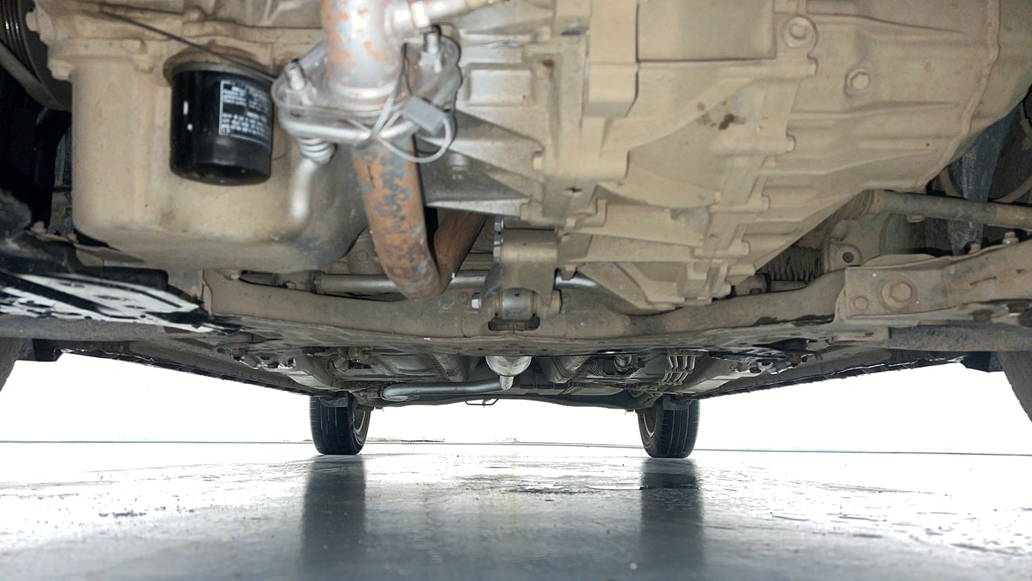 Used 2022 Maruti Suzuki XL6 Zeta MT Petrol Petrol Manual extra FRONT LEFT UNDERBODY VIEW