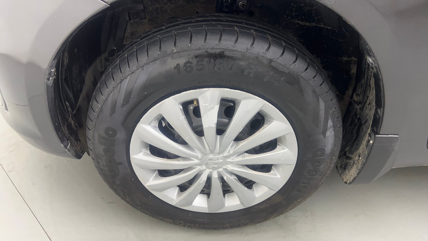 Used 2015 Maruti Suzuki Swift VXi Petrol Manual tyres LEFT FRONT TYRE RIM VIEW