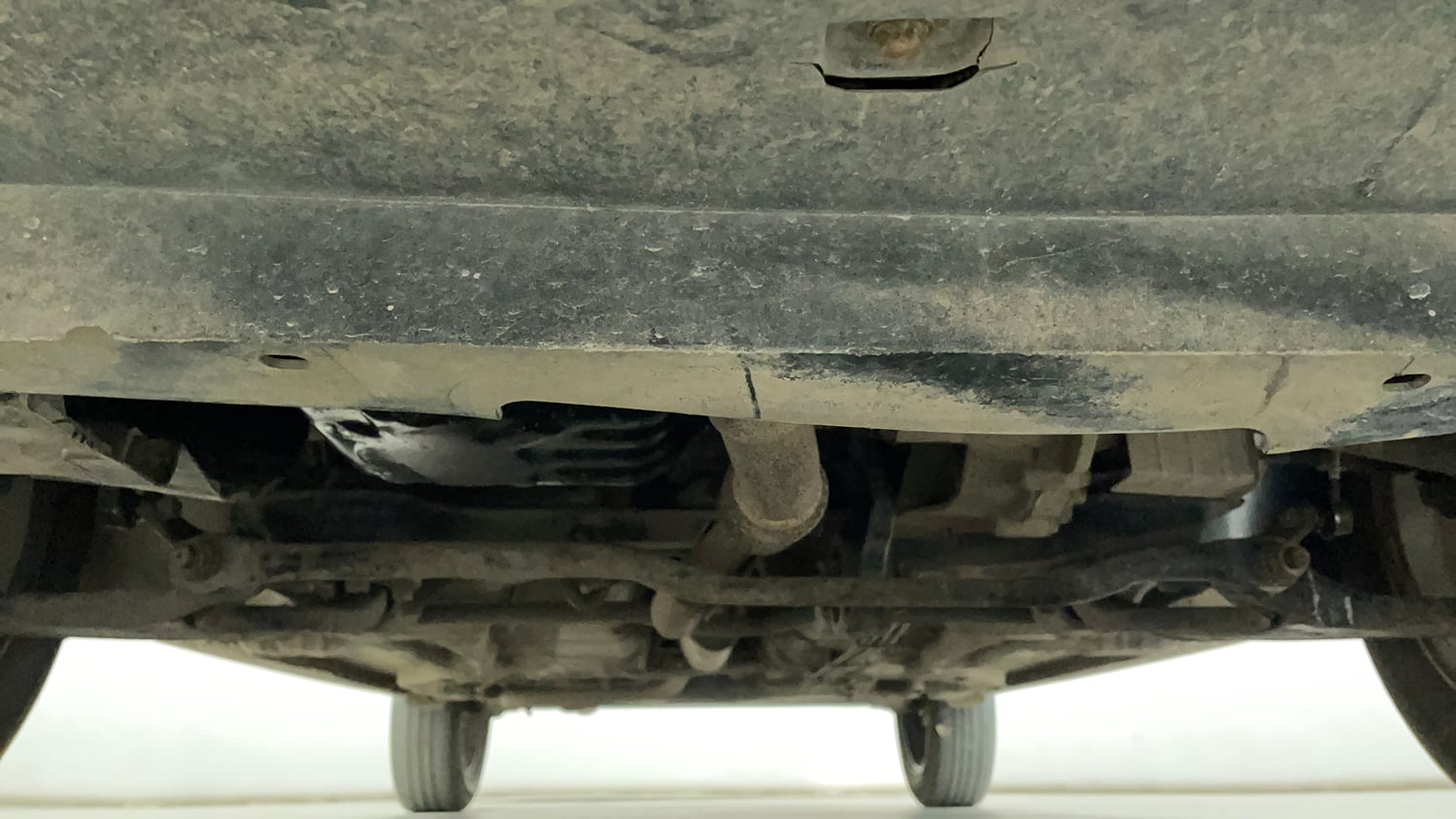 Used 2019 Tata Tigor Revotron XZA Petrol Automatic extra FRONT LEFT UNDERBODY VIEW