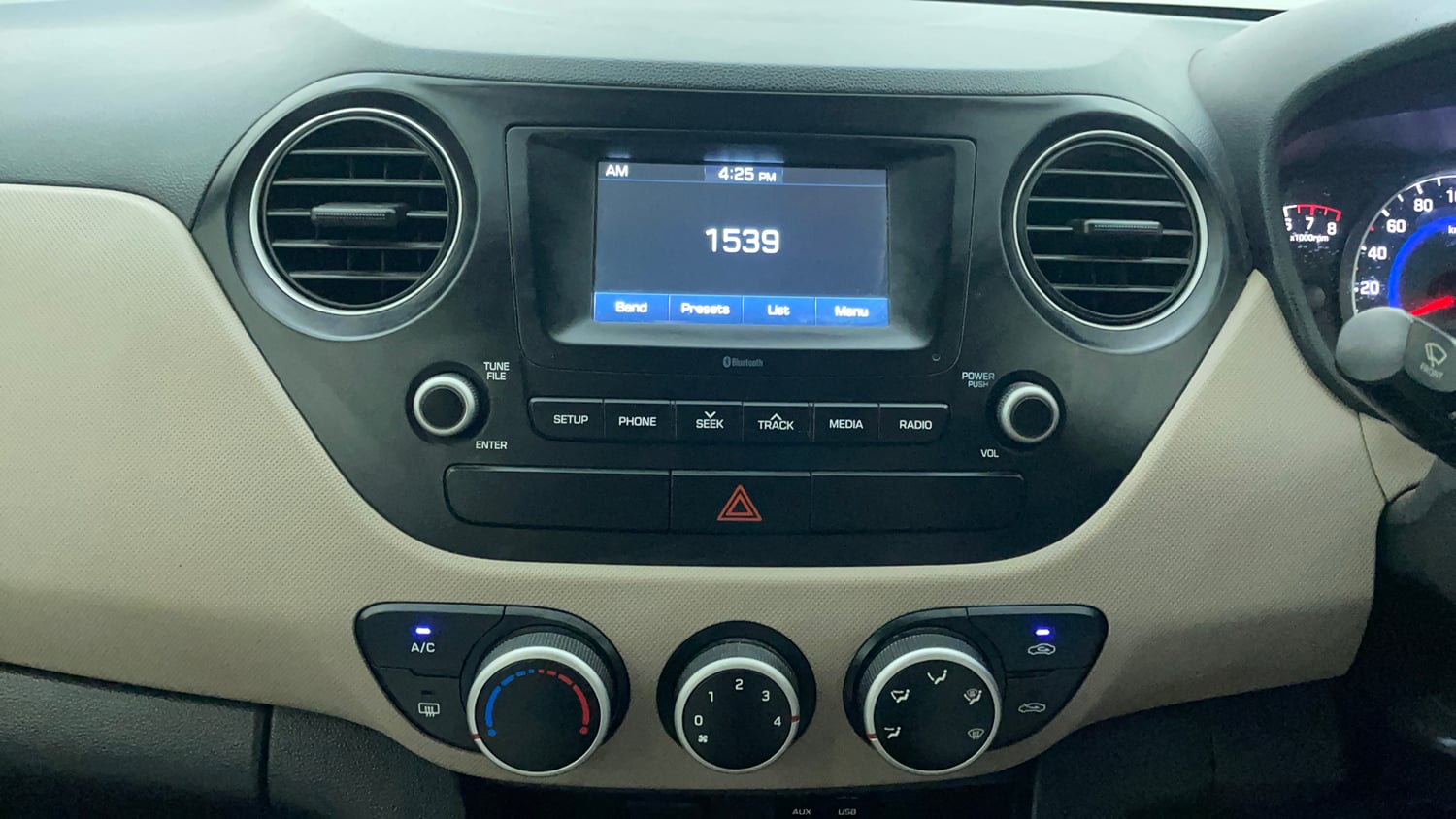 Used 2018 Hyundai Grand i10 Sportz 1.2 Kappa VTVT Petrol Manual interior MUSIC SYSTEM & AC CONTROL VIEW