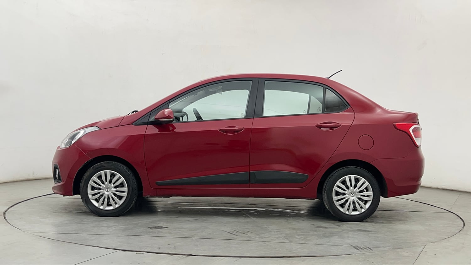 Used 2014 Hyundai Xcent SX 1.2 (O) Petrol Manual exterior LEFT SIDE VIEW