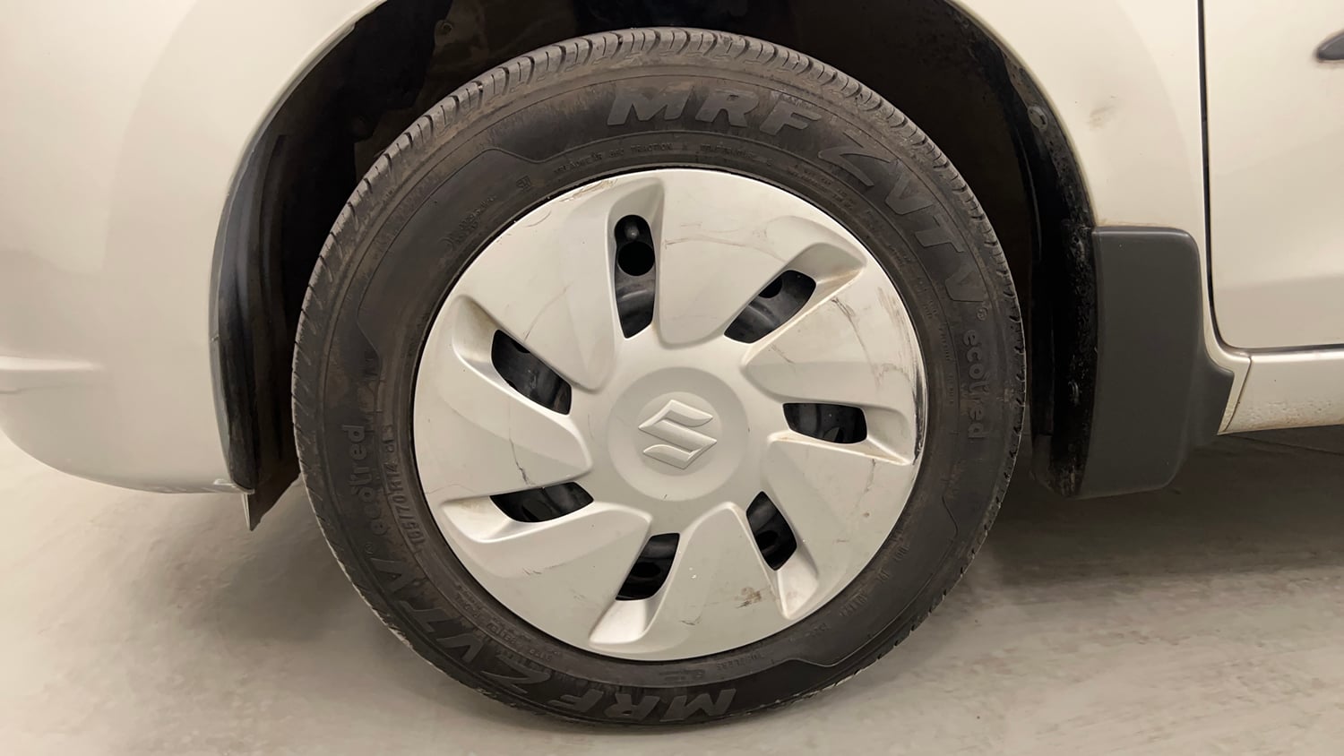 Used 2016 Maruti Suzuki Celerio VXi AMT Petrol Automatic tyres LEFT FRONT TYRE RIM VIEW