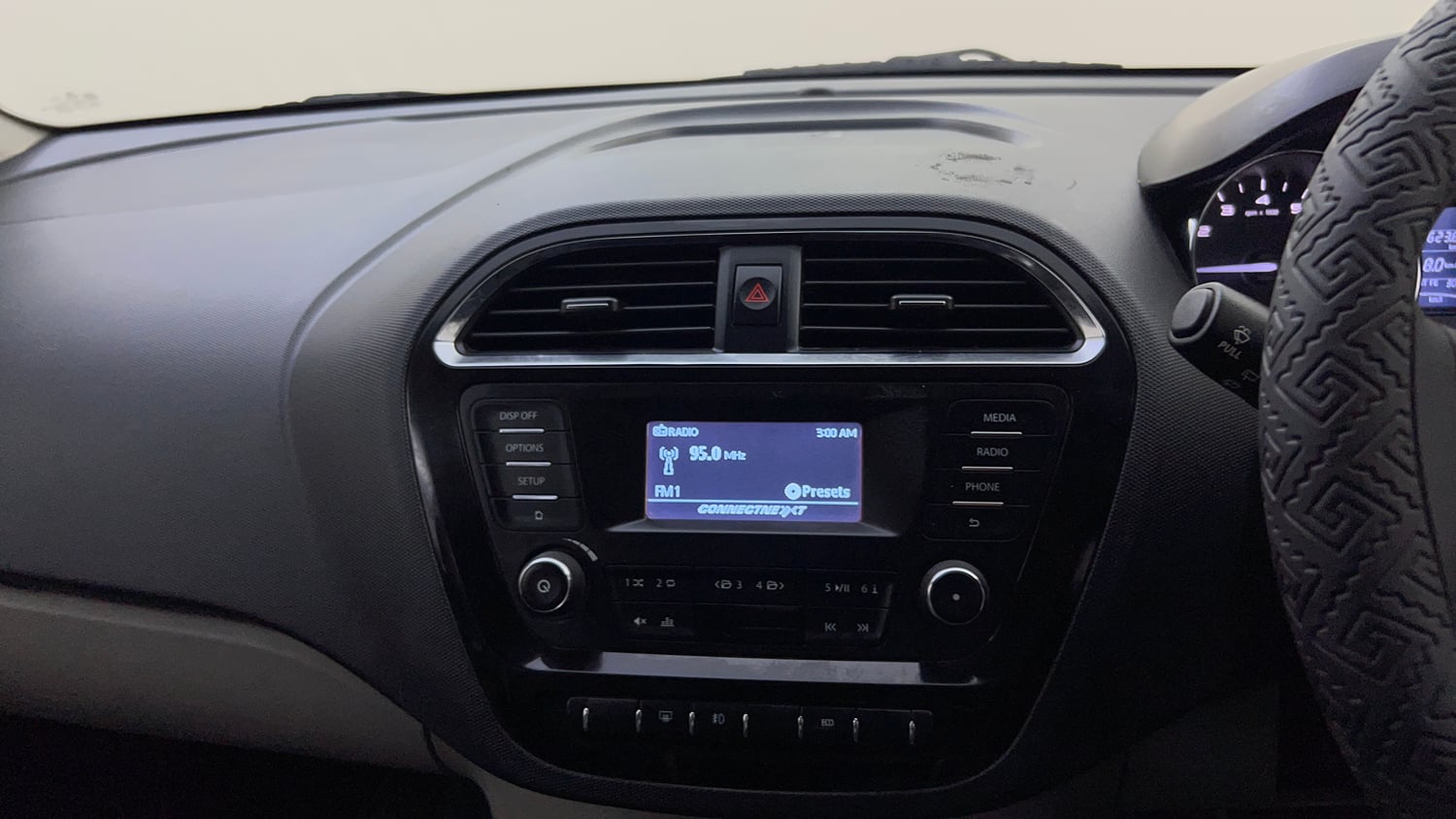Used 2018 Tata Tiago Revotron XZ Petrol Manual top_features Integrated (in-dash) music system