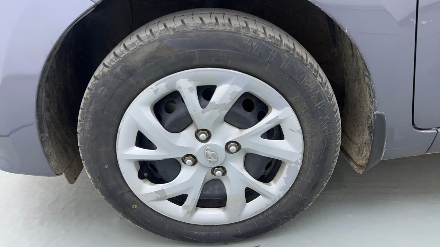 Used 2017 Hyundai Grand i10 Magna 1.2 Kappa VTVT Petrol Manual tyres LEFT FRONT TYRE RIM VIEW