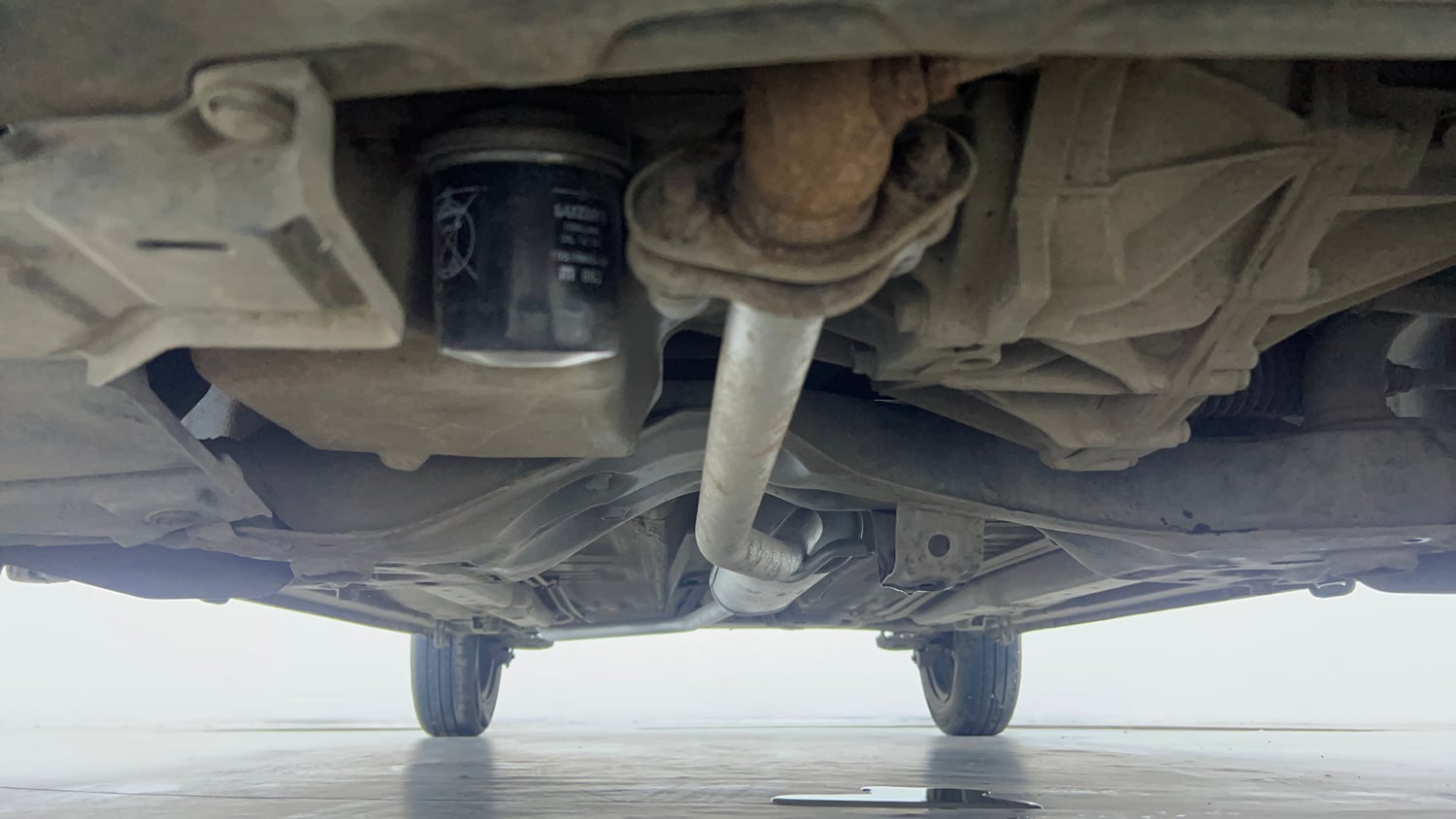 Used 2016 Maruti Suzuki Celerio ZXi AMT Petrol Automatic extra FRONT LEFT UNDERBODY VIEW