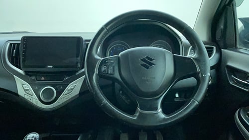 Used 2016 Maruti Suzuki Baleno Zeta 1.2 Petrol Manual interior STEERING VIEW