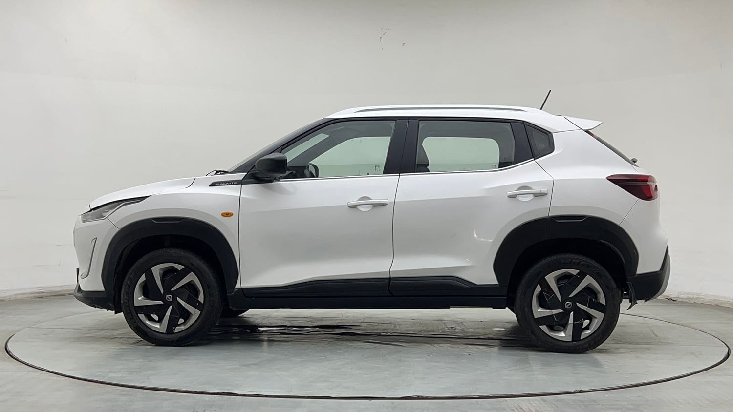 Used 2021 Nissan Magnite XE Petrol Manual exterior LEFT SIDE VIEW