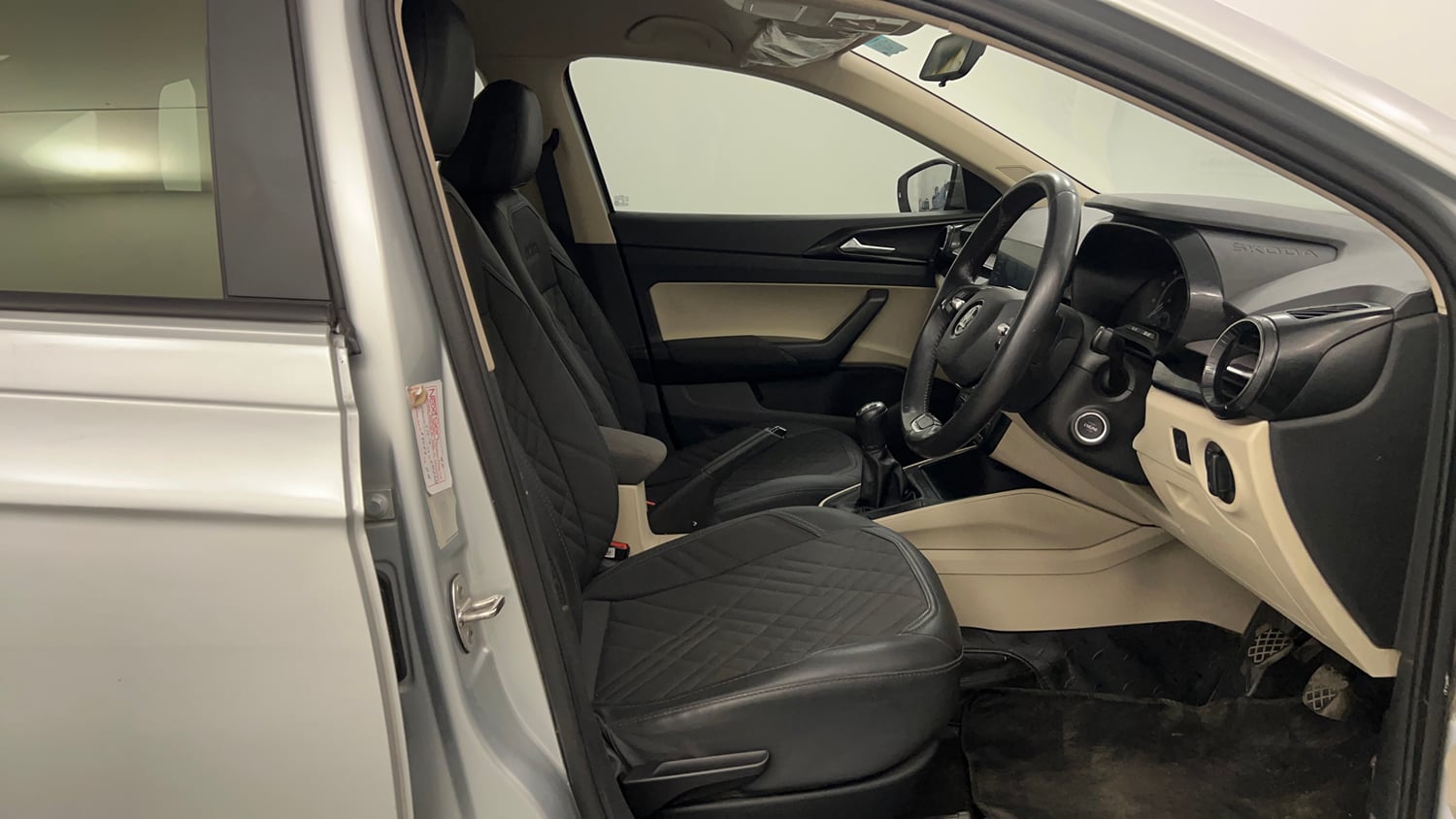 Used 2023 Skoda Slavia Ambition 1.5L TSI MT Petrol Manual interior RIGHT SIDE FRONT DOOR CABIN VIEW