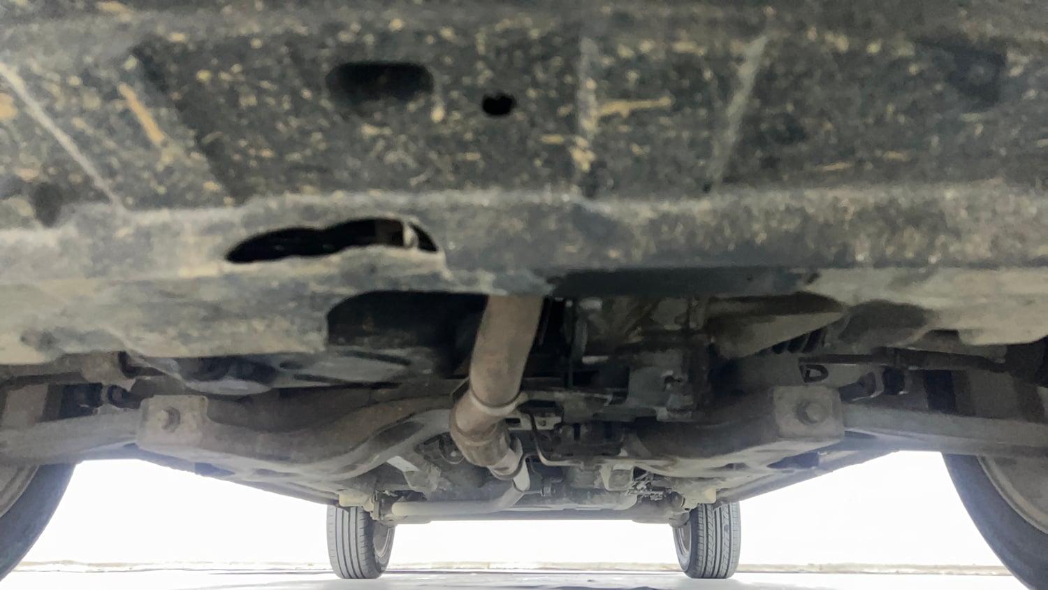 Used 2015 Tata Zest XT Petrol Petrol Manual extra FRONT LEFT UNDERBODY VIEW