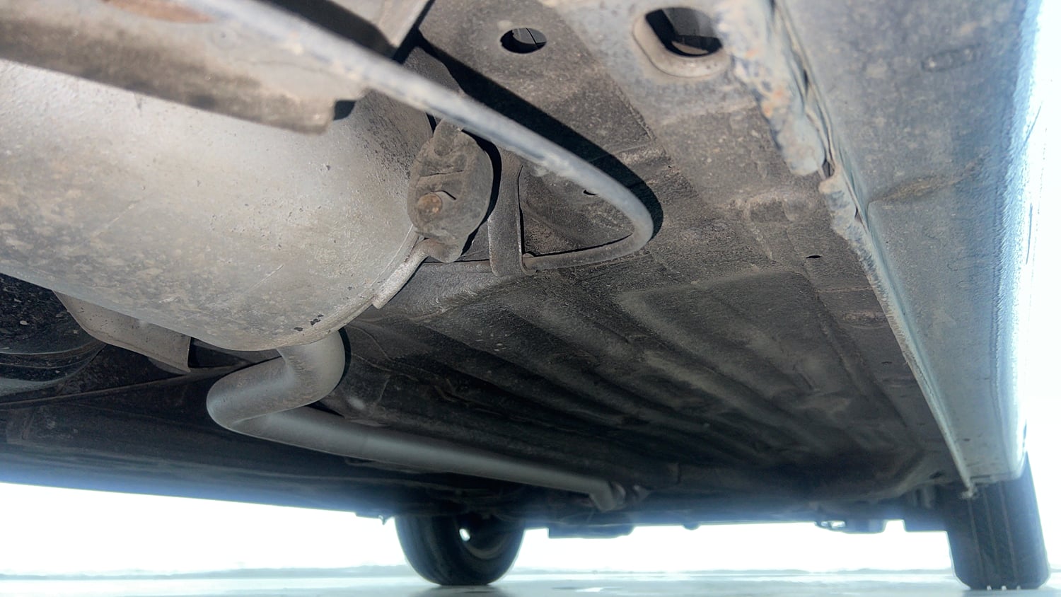Used 2023 Honda Amaze VX 1.2 Petrol CVT Petrol Automatic extra REAR RIGHT UNDERBODY VIEW