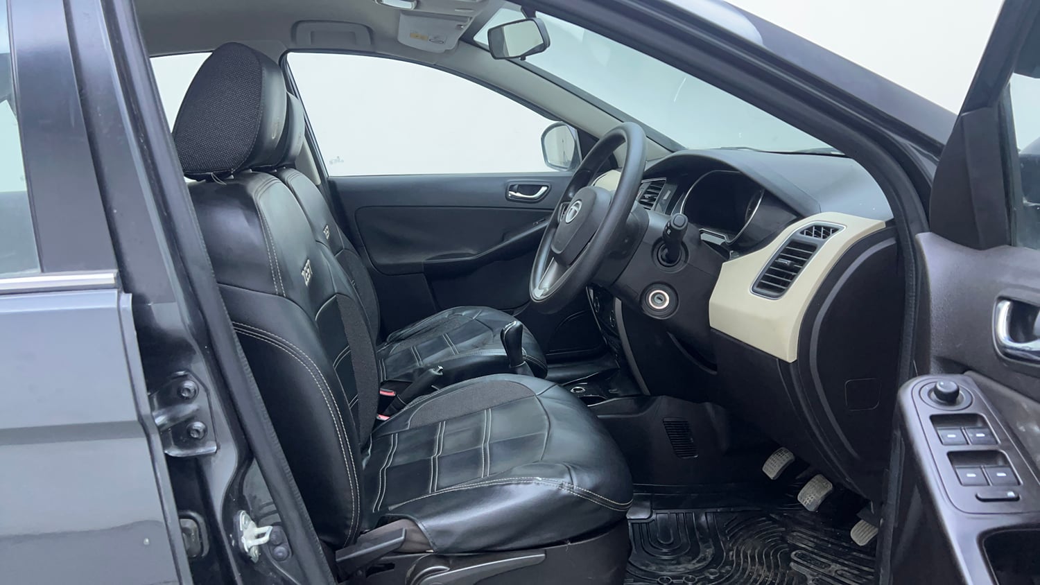 Used 2015 Tata Zest XT Petrol Petrol Manual interior RIGHT SIDE FRONT DOOR CABIN VIEW