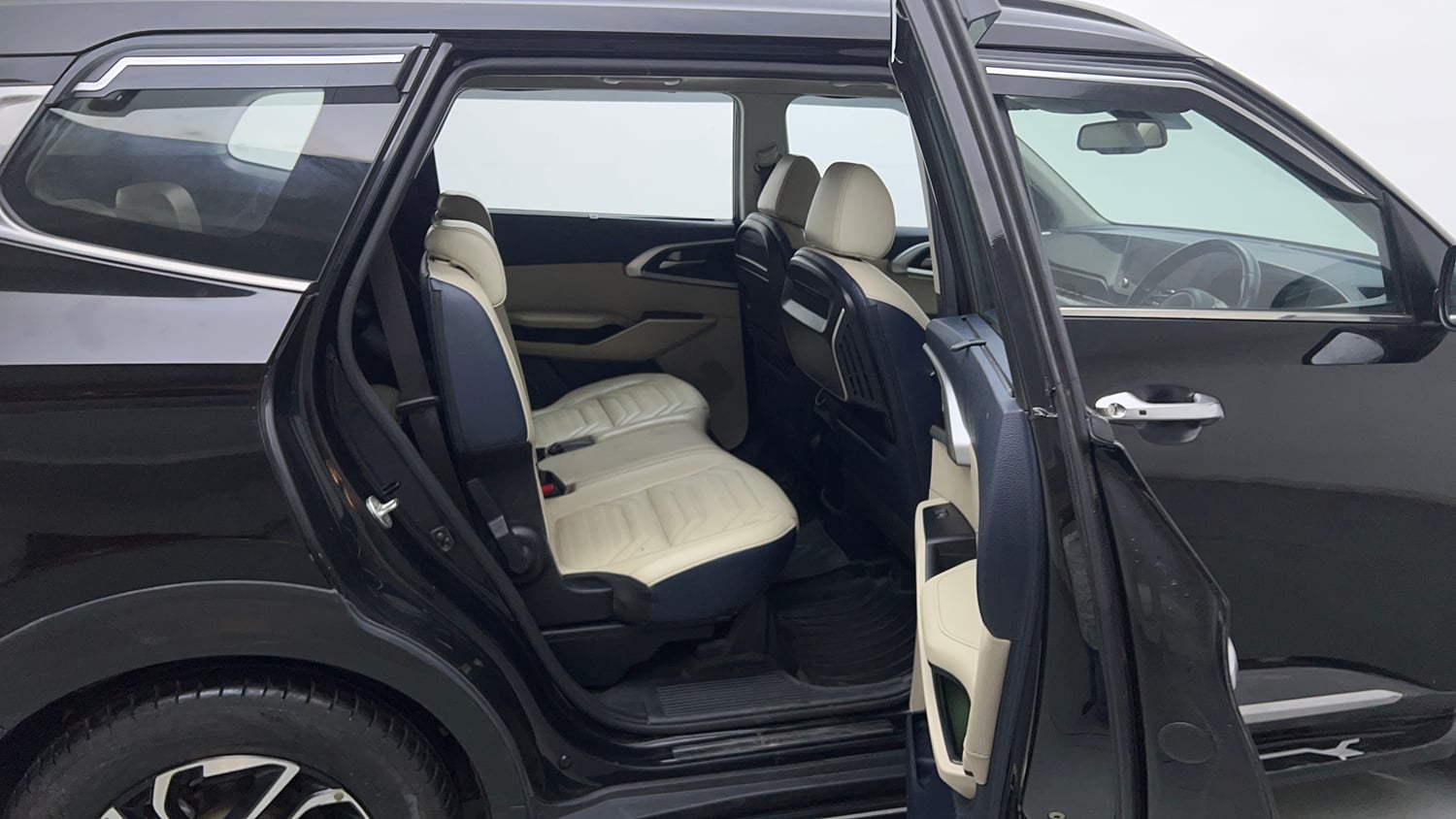 Used 2022 Kia Carens Luxury Plus 1.4 Petrol DCT 7 STR Petrol Automatic interior RIGHT SIDE REAR DOOR CABIN VIEW
