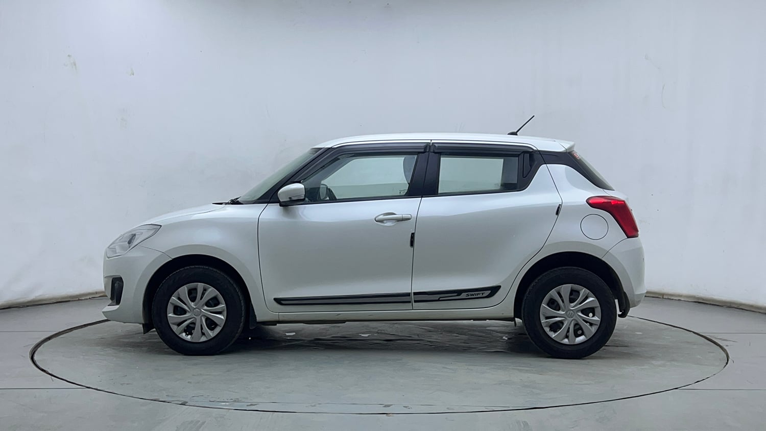Used 2023 Maruti Suzuki Swift VXi Petrol Manual exterior LEFT SIDE VIEW