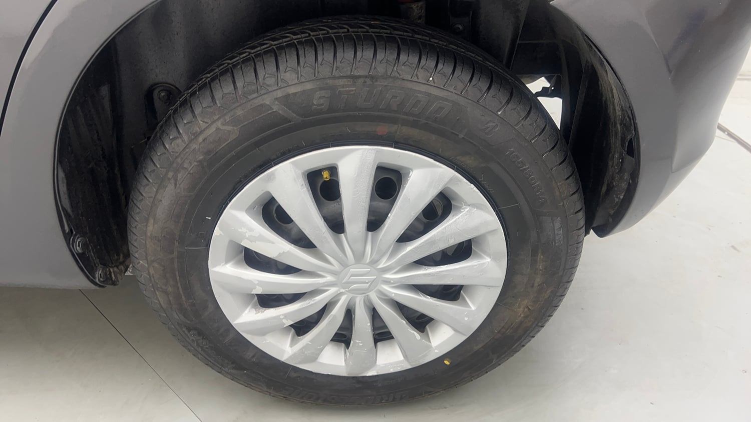 Used 2015 Maruti Suzuki Swift VXi Petrol Manual tyres LEFT REAR TYRE RIM VIEW