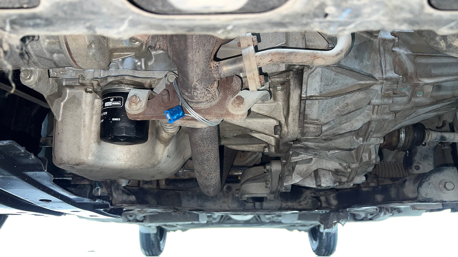 Used 2021 Maruti Suzuki Swift VXi AMT Petrol Automatic extra FRONT LEFT UNDERBODY VIEW