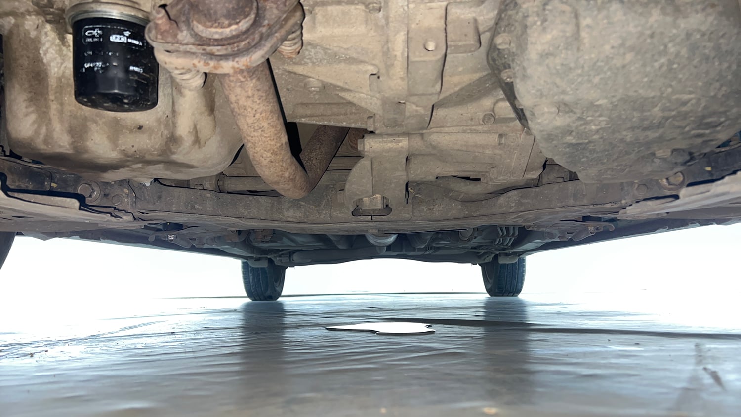 Used 2021 Maruti Suzuki New Ertiga ZXi AT Petrol Automatic extra FRONT LEFT UNDERBODY VIEW