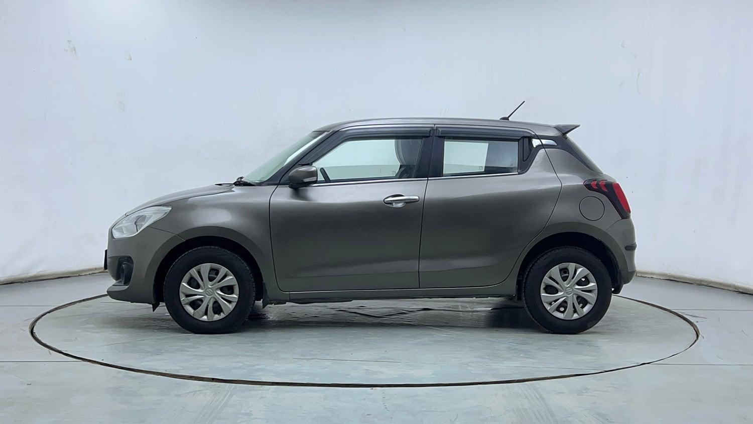 Used 2022 Maruti Suzuki Swift VXi Petrol Manual exterior LEFT SIDE VIEW