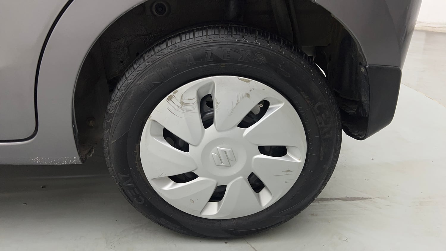 Used 2016 Maruti Suzuki Celerio ZXi AMT Petrol Automatic tyres LEFT REAR TYRE RIM VIEW