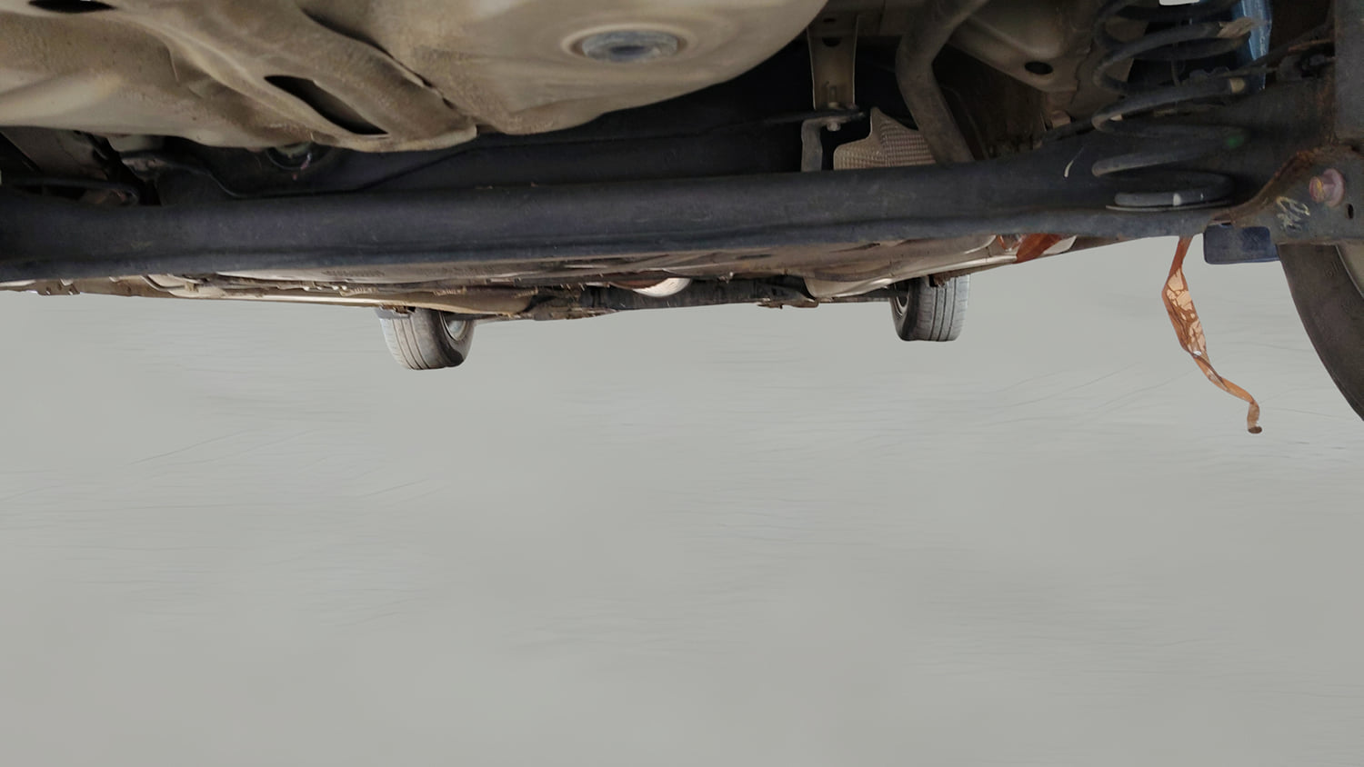 Used 2020 Maruti Suzuki Dzire VXi AMT Petrol Automatic extra REAR UNDERBODY VIEW (TAKEN FROM REAR)