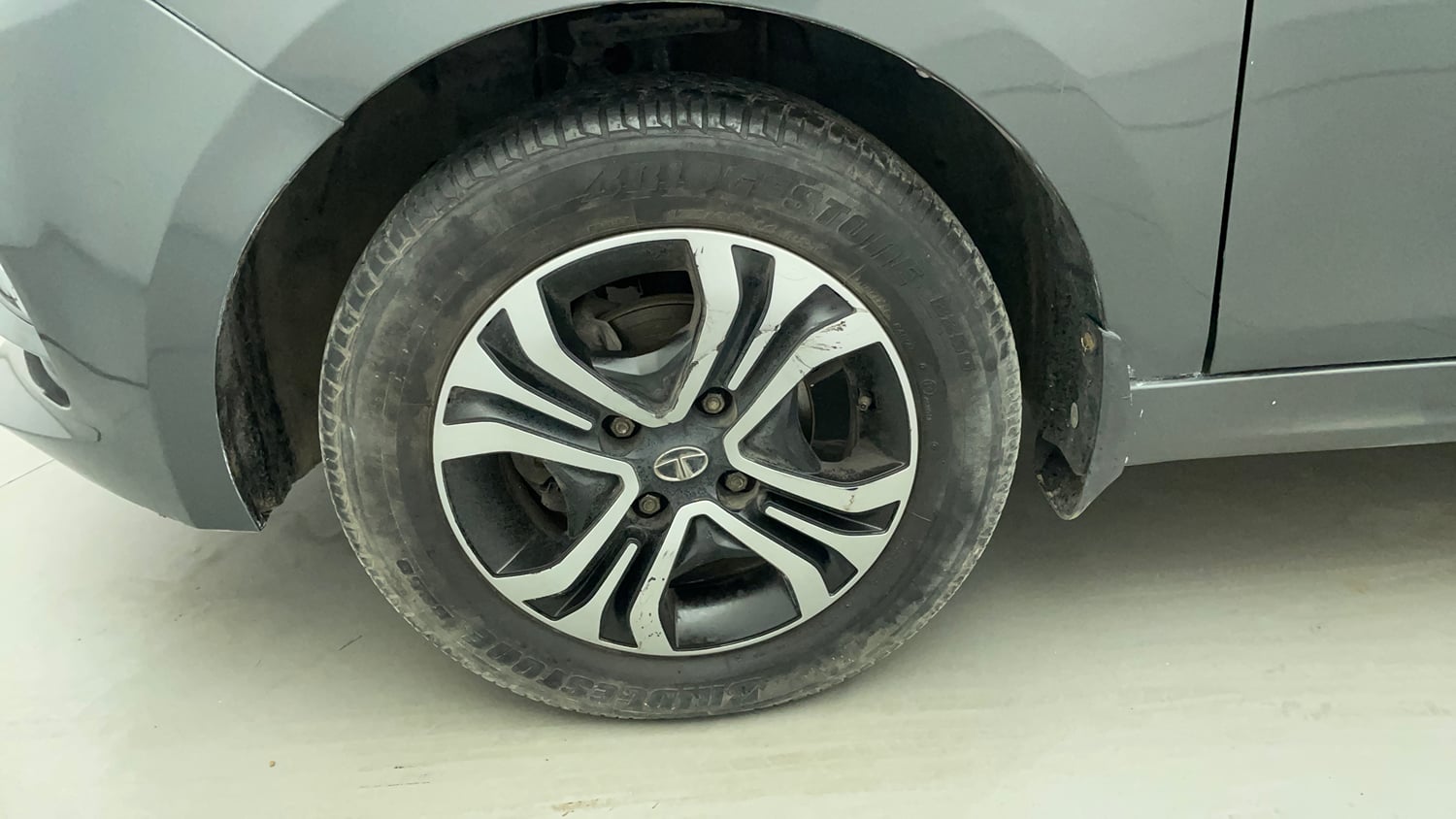 Used 2021 Tata Tiago XZ Petrol Manual tyres LEFT FRONT TYRE RIM VIEW