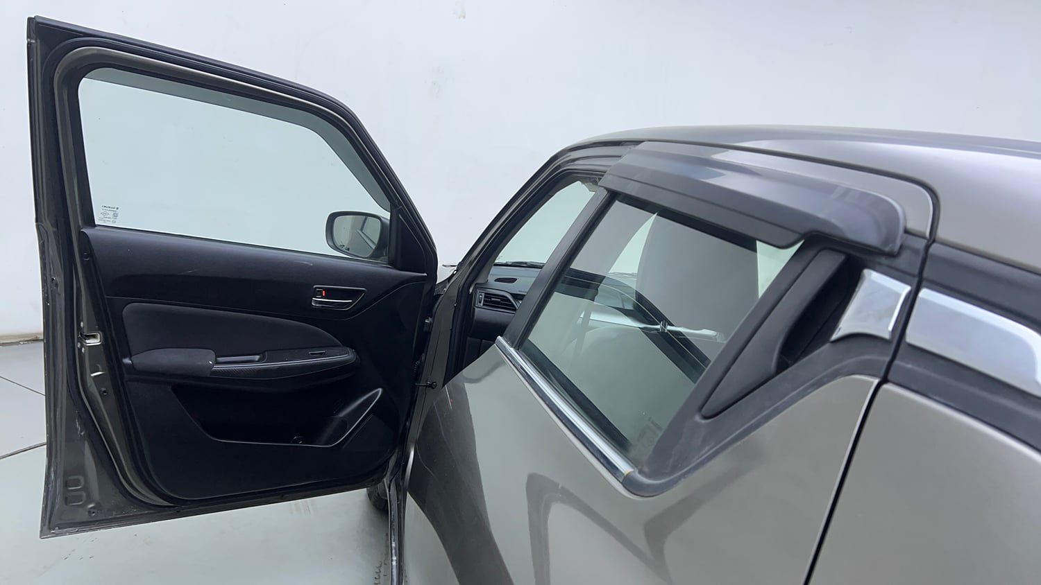 Used 2022 Maruti Suzuki Swift VXi Petrol Manual interior LEFT FRONT DOOR OPEN VIEW