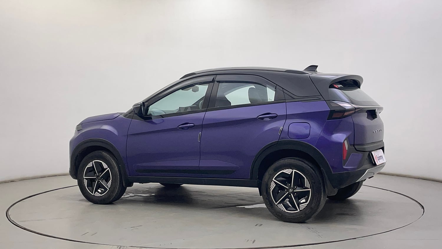 Used 2023 Tata Nexon Fearless Plus S Purple 1.2 Revotron Petrol 7DCA Dual Tone Petrol Automatic exterior LEFT REAR CORNER VIEW
