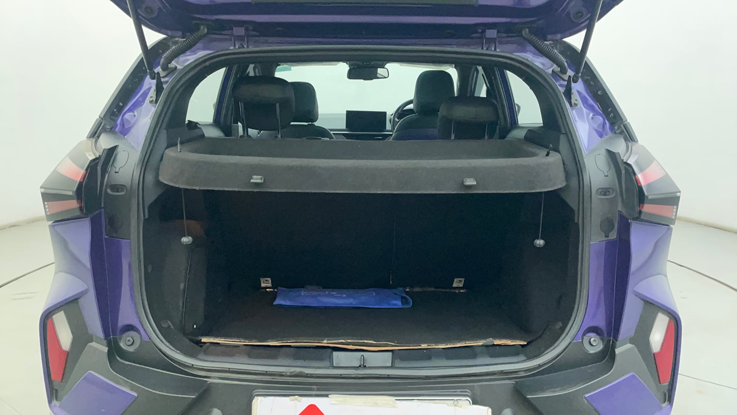 Used 2023 Tata Nexon Fearless Plus S Purple 1.2 Revotron Petrol 7DCA Dual Tone Petrol Automatic interior DICKY INSIDE VIEW