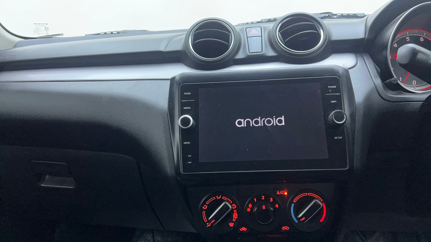 Used 2022 Maruti Suzuki Swift VXi Petrol Manual interior MUSIC SYSTEM & AC CONTROL VIEW