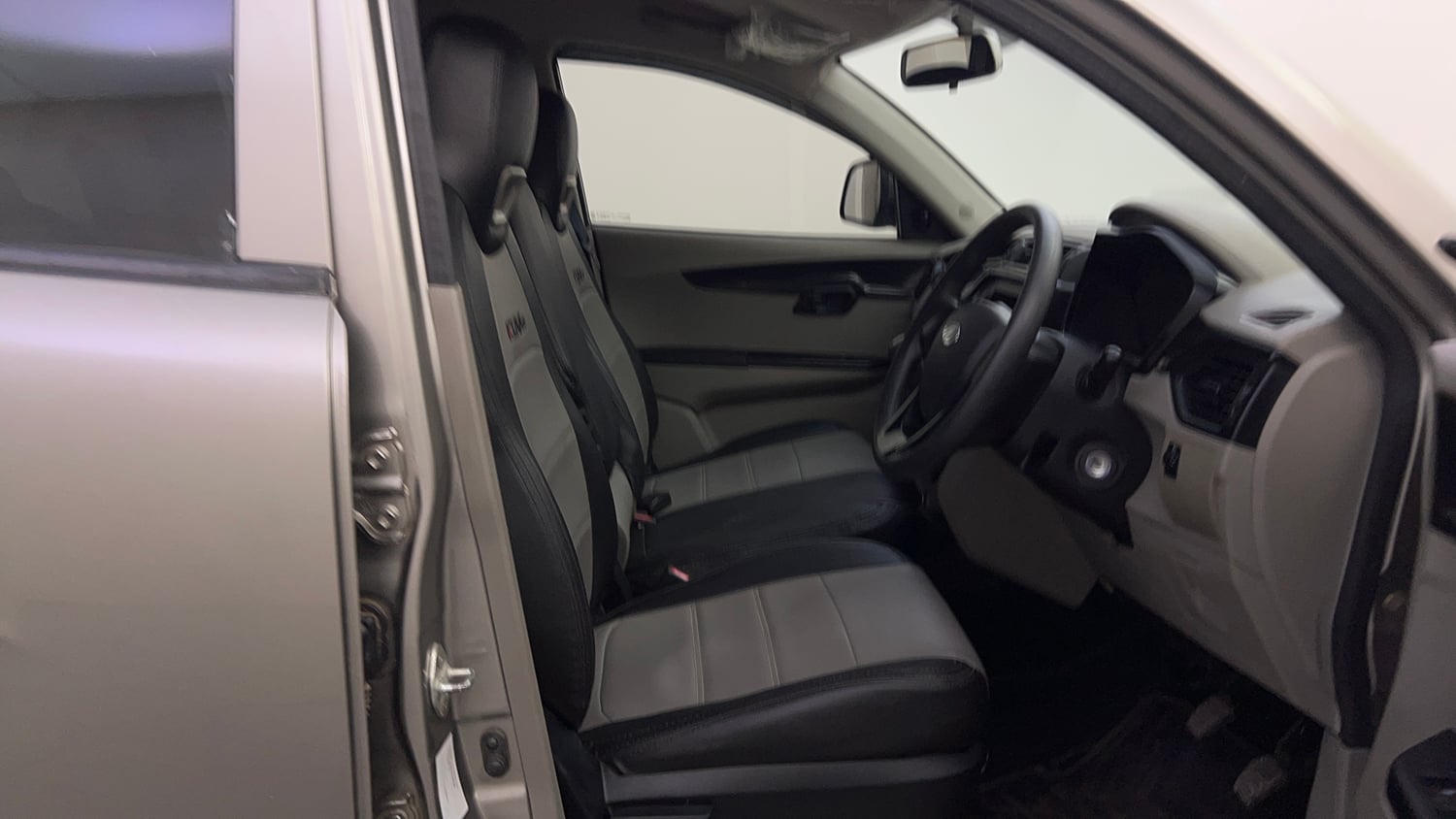 Used 2017 Mahindra KUV100 K4 6 STR Petrol Manual interior RIGHT SIDE FRONT DOOR CABIN VIEW