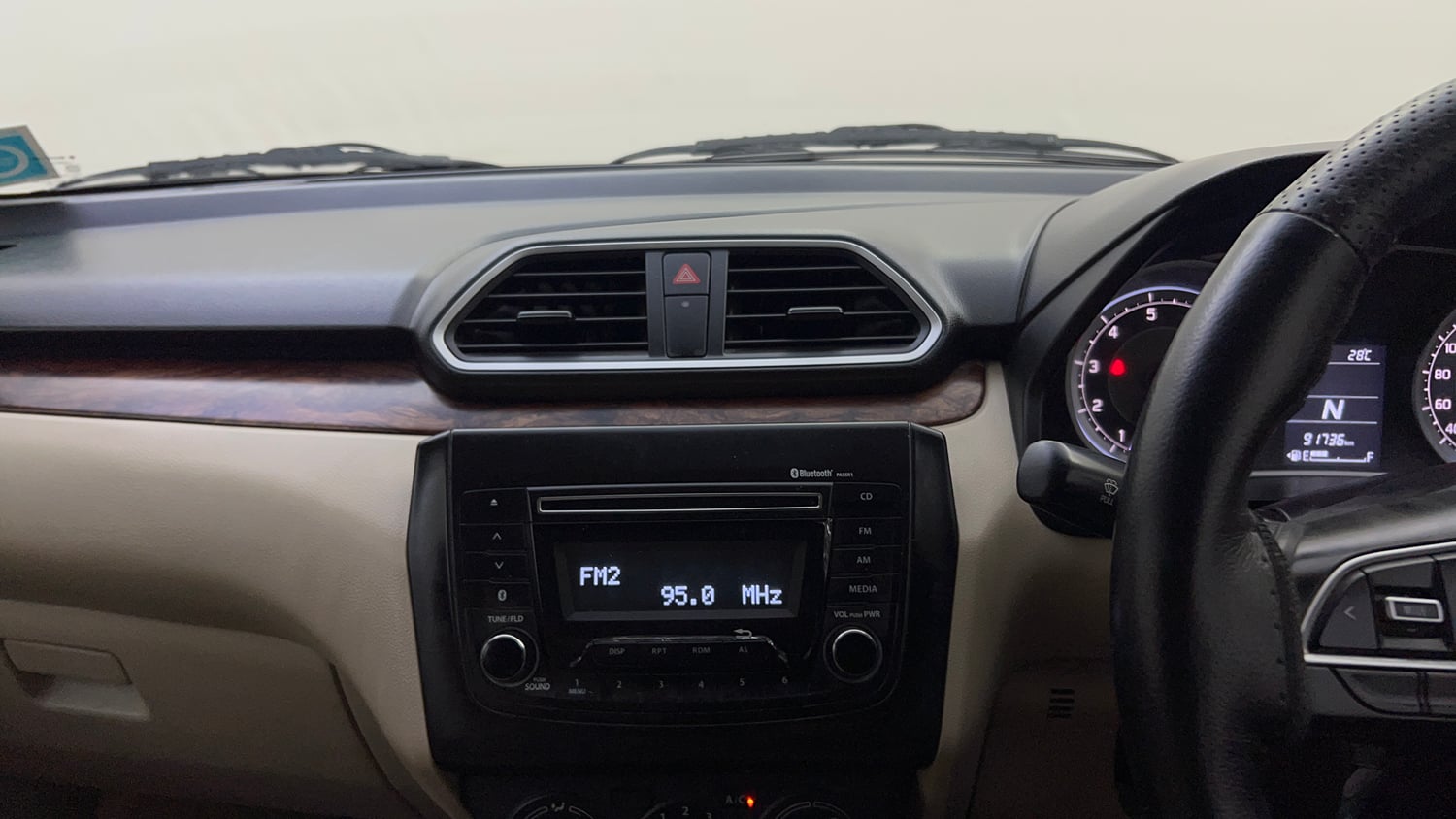 Used 2017 Maruti Suzuki Dzire VXi AMT Petrol Automatic top_features Integrated (in-dash) music system