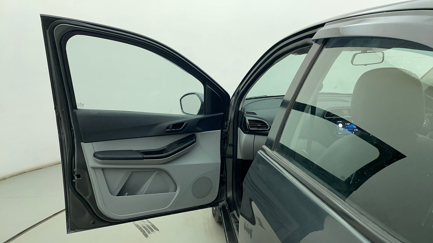 Used 2021 Tata Tiago XZ Petrol Manual interior LEFT FRONT DOOR OPEN VIEW