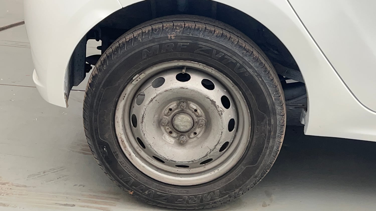 Used 2021 Tata Tiago XE Petrol Manual tyres RIGHT REAR TYRE RIM VIEW