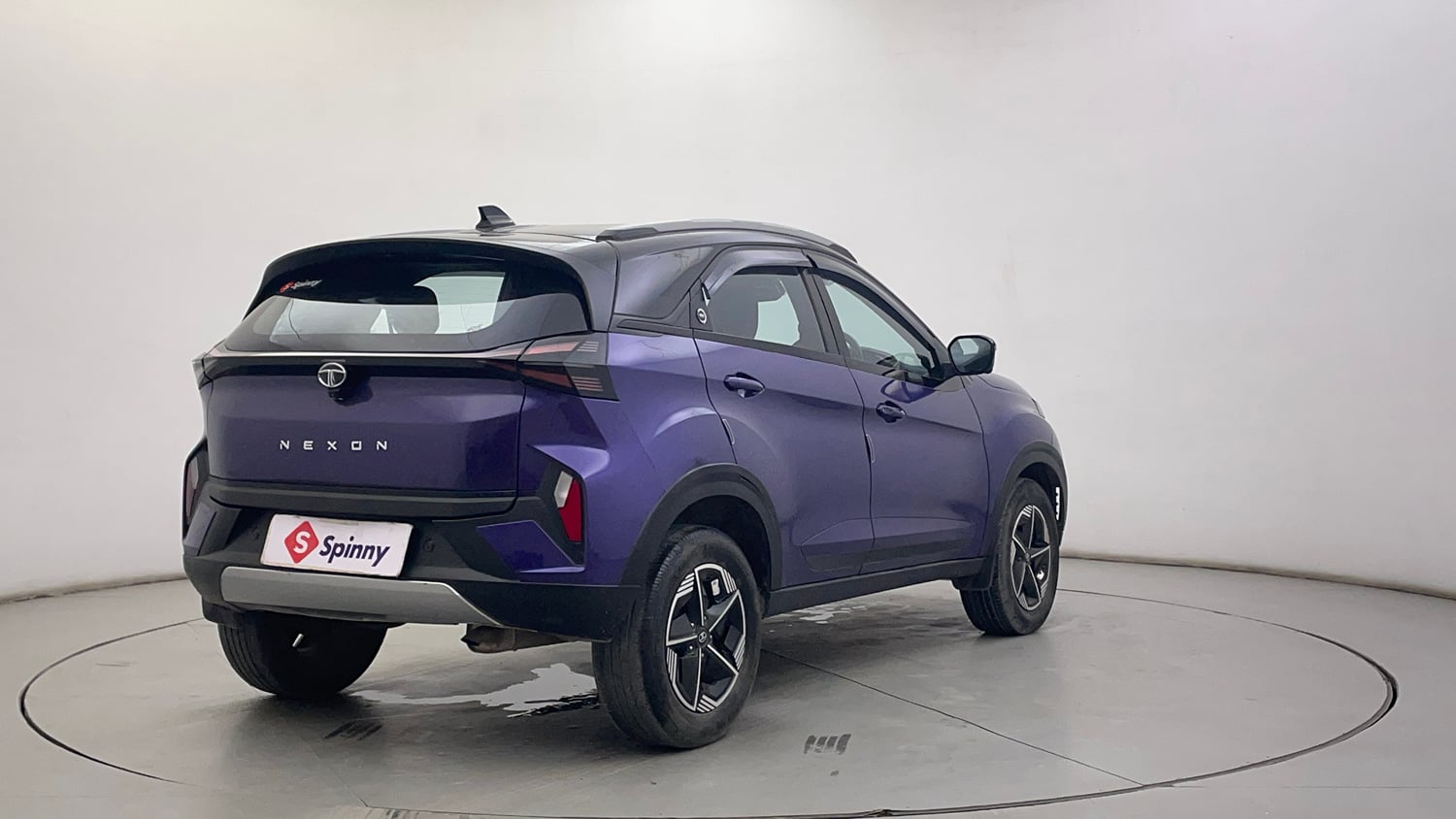 Used 2023 Tata Nexon Fearless Plus S Purple 1.2 Revotron Petrol 7DCA Dual Tone Petrol Automatic exterior RIGHT REAR CORNER VIEW
