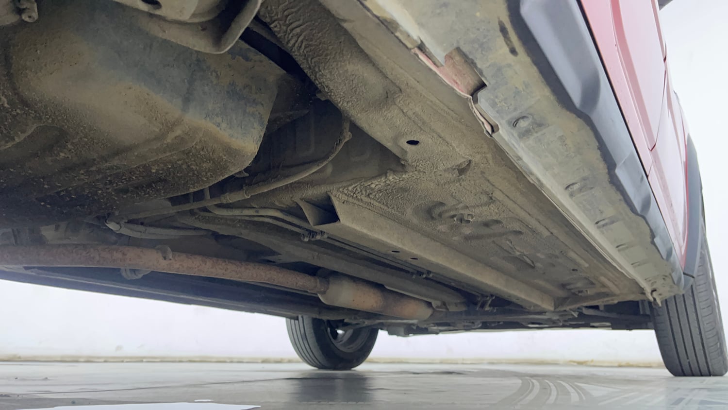 Used 2021 Renault Kiger RXZ Turbo CVT Dual Tone Petrol Automatic extra REAR RIGHT UNDERBODY VIEW