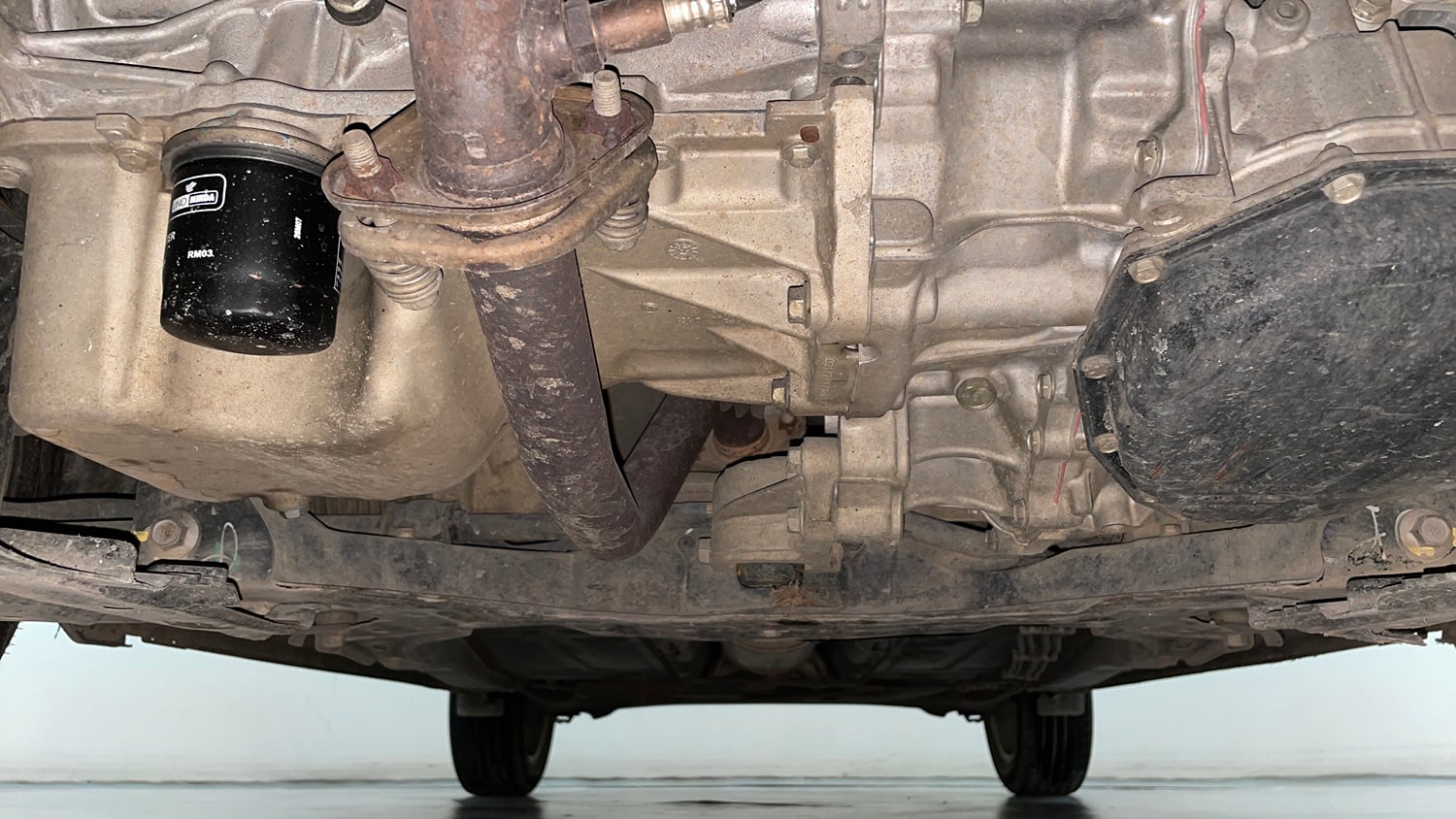 Used 2021 Maruti Suzuki Baleno Zeta Automatic Petrol Automatic extra FRONT LEFT UNDERBODY VIEW