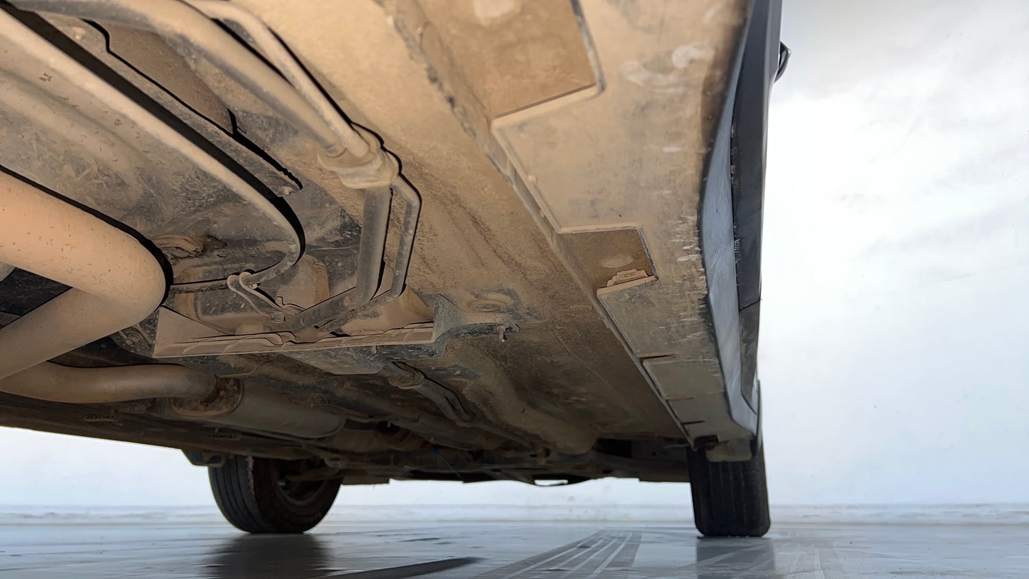 Used 2022 Kia Carens Luxury 1.4 Petrol 7 STR Petrol Manual extra REAR RIGHT UNDERBODY VIEW