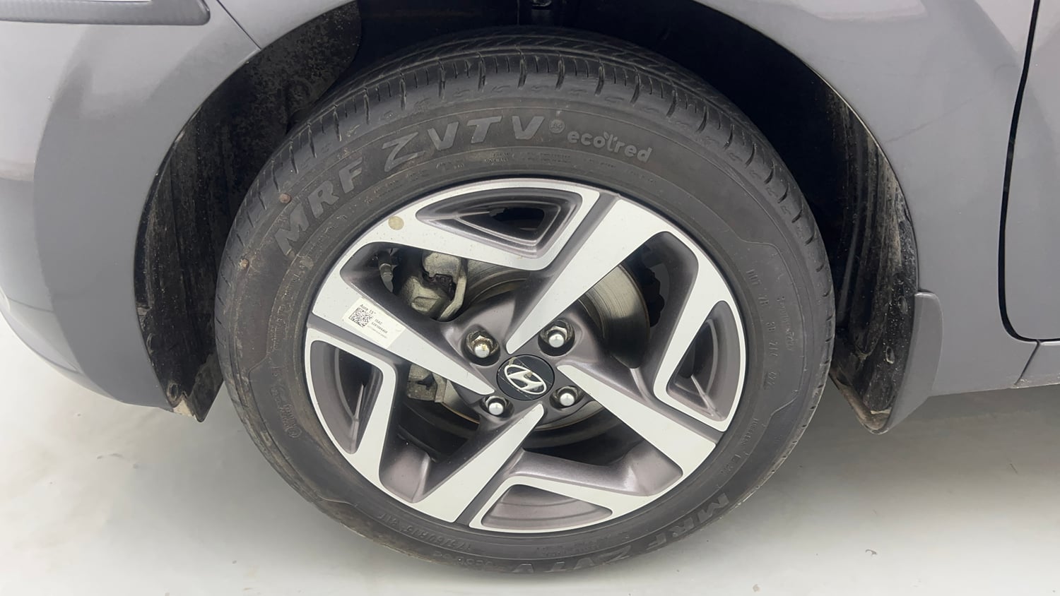 Used 2023 Hyundai Aura SX 1.2 Petrol Petrol Manual tyres LEFT FRONT TYRE RIM VIEW