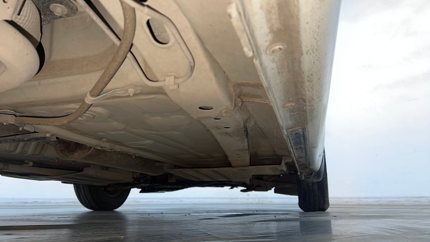 Used 2024 Maruti Suzuki Swift VXi (O) AMT Petrol Automatic extra REAR RIGHT UNDERBODY VIEW