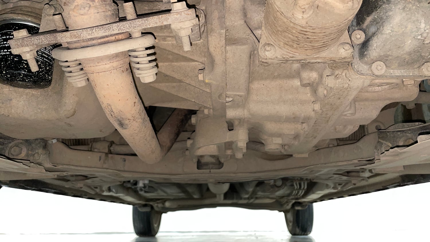 Used 2022 Maruti Suzuki XL6 Alpha Plus AT Petrol Petrol Automatic extra FRONT LEFT UNDERBODY VIEW