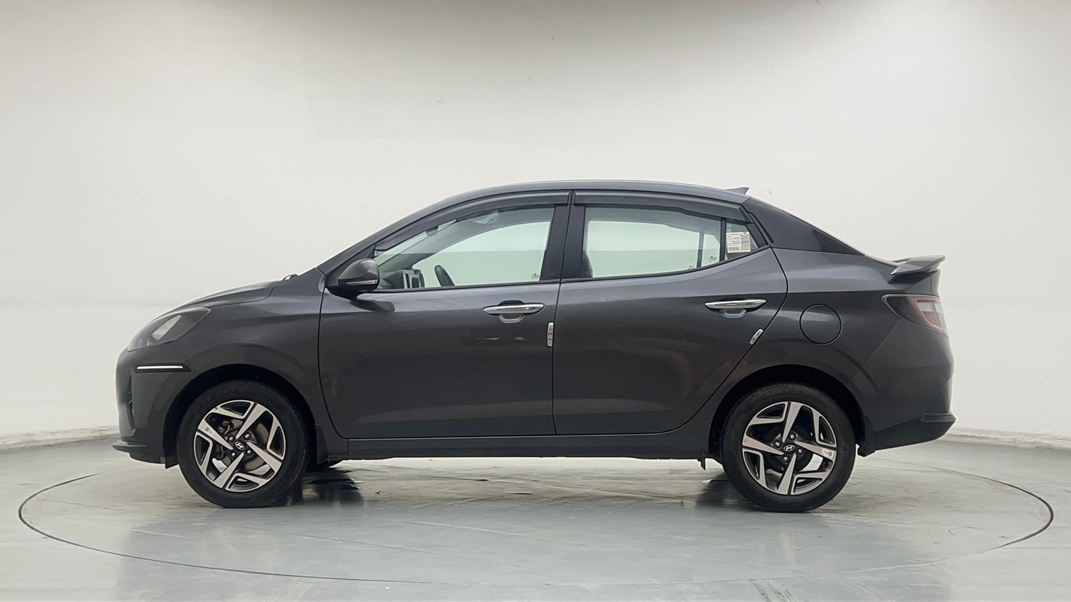 Used 2023 Hyundai Aura SX 1.2 Petrol Petrol Manual exterior LEFT SIDE VIEW