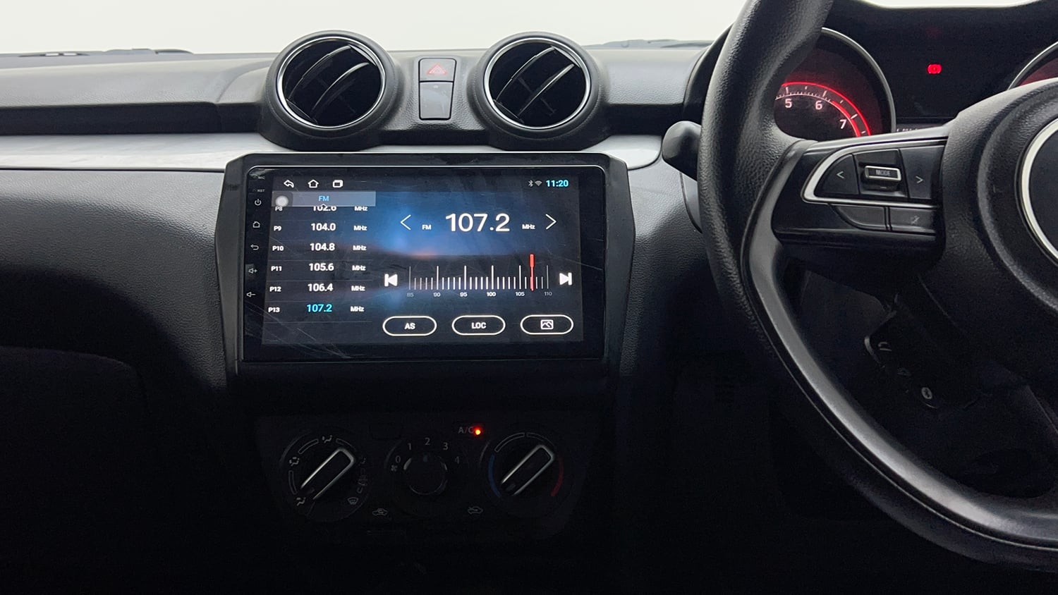 Used 2020 Maruti Suzuki Swift VXi Petrol Manual interior MUSIC SYSTEM & AC CONTROL VIEW