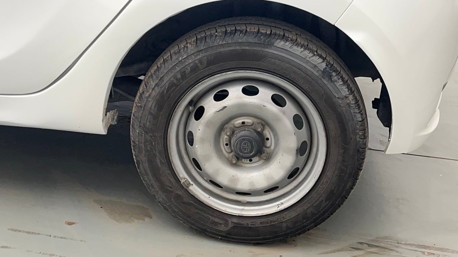 Used 2021 Tata Tiago XE Petrol Manual tyres LEFT REAR TYRE RIM VIEW